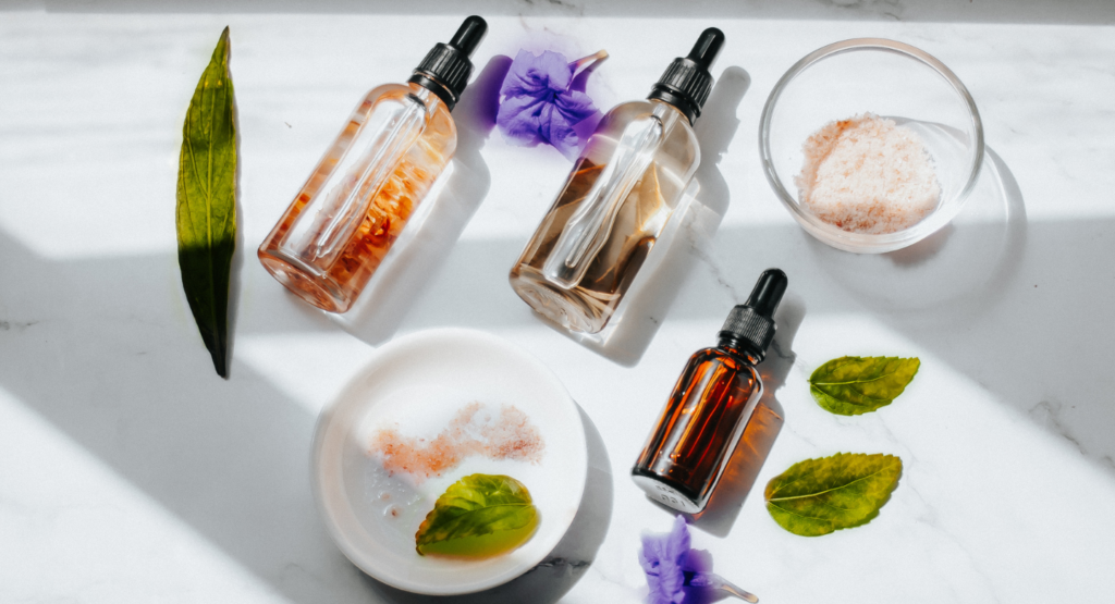 Flower essence bottles with leaves